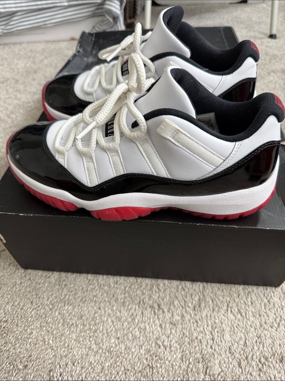 Jordan Men’s Low Top Sneakers in White, Black & Red